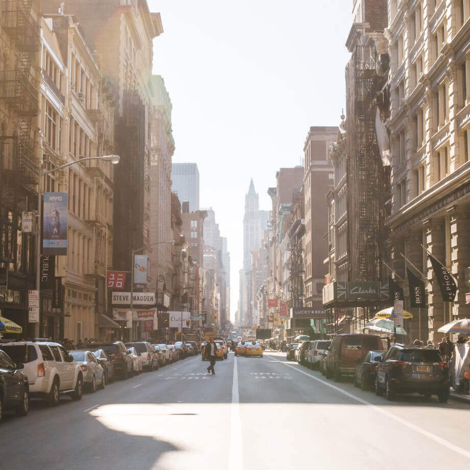 New York City Street with tall buildings on either side